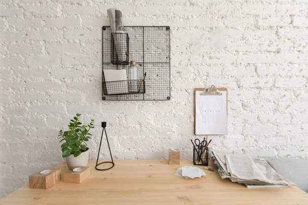 istock Wooden working table in home office Loft workspace 937174296