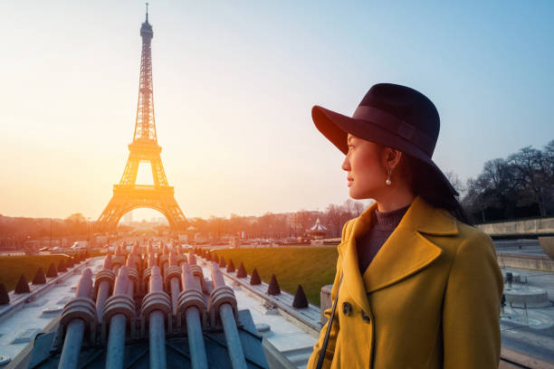 istock Eiffel Tower tourist posing smiling by Eiffel Tower, Paris, France 937179822