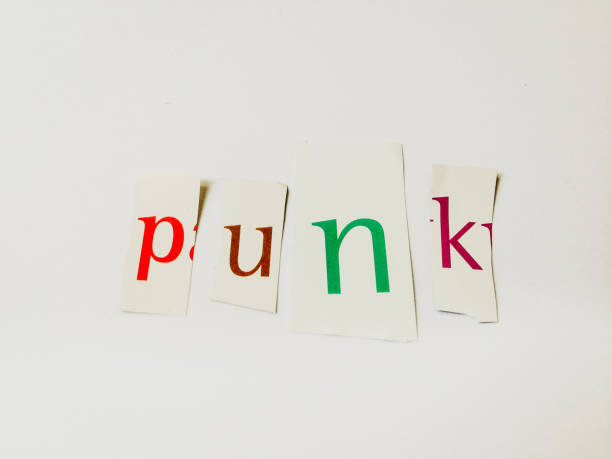 istock Punk - Cutout Words Collage Of Mixed Magazine Letters with White Background 937183132