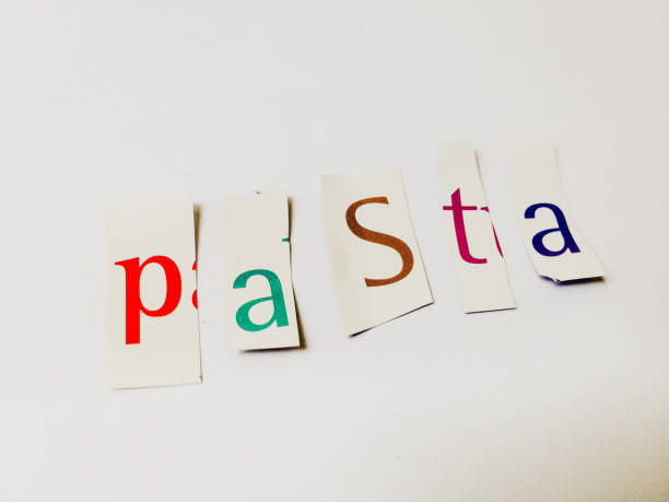 istock Pasta - Cutout Words Collage Of Mixed Magazine Letters with White Background 937183146
