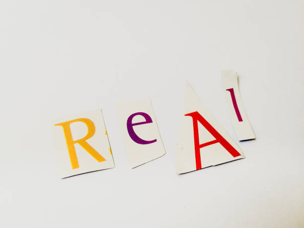istock Real - Cutout Words Collage Of Mixed Magazine Letters with White Background 937183184