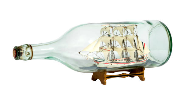 istock Model sailing ship in a glass bottle 937183596
