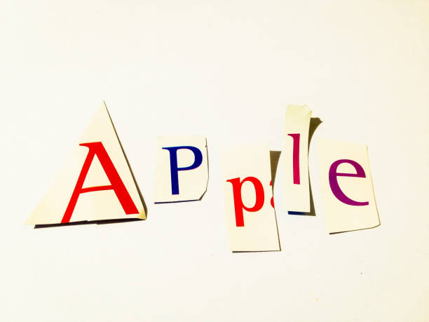 istock Apple - Cutout Words Collage Of Mixed Magazine Letters with White Background 937183734