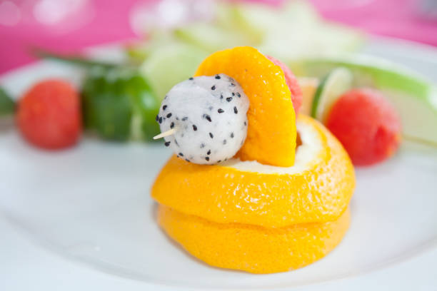 istock fruit for cocktail topping,Fresh fruit party plate 937209952