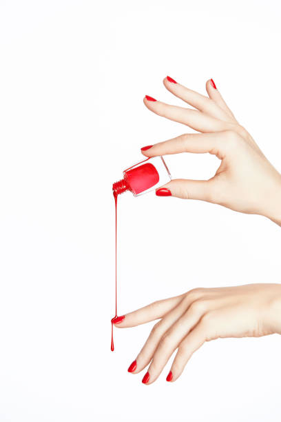 istock Red Nail Polish. Hand With Red Nails On White Background 937210184