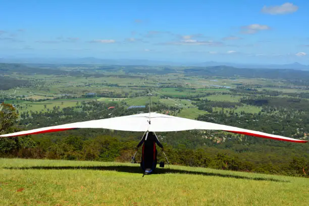 Photo of Hang-glider taking off a mountain top