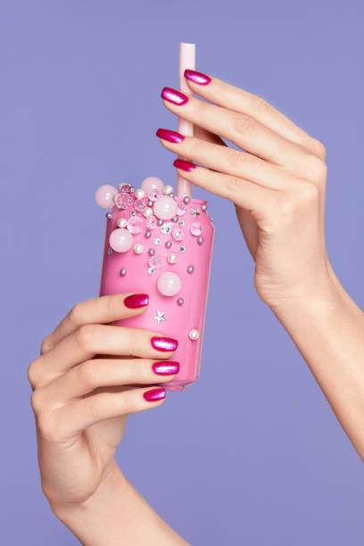 istock Pink Nails. Woman With Soda Can In Hands 937213788