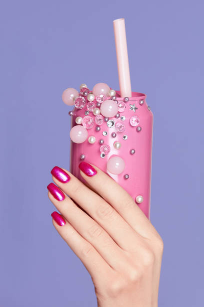 istock Pink Nails. Woman With Soda Can In Hands 937214910