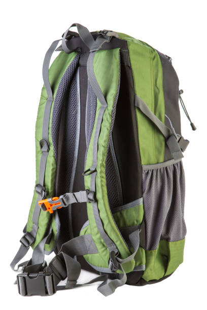 istock backpack of medium size, black with green on white background 937216614