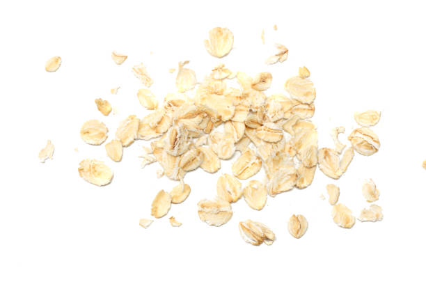 istock oatmeal isolated on white background. top view 937216788