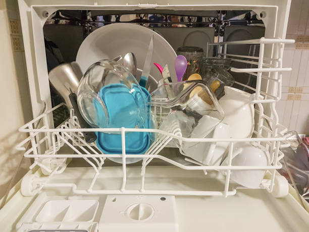 istock wash machine plates glass spoons blue plastic 937216930