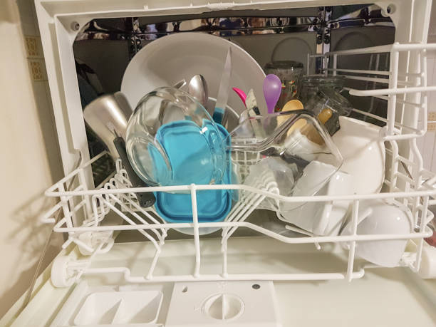 istock wash machine plates glass spoons blue plastic 937217090