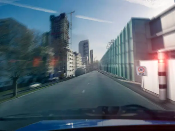 Photo of Car driver drives in a speed control