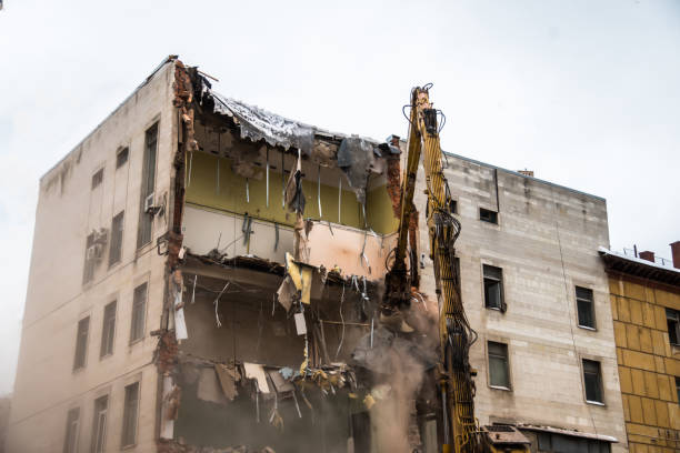istock Building demolition with hydraulic crashers 937227634