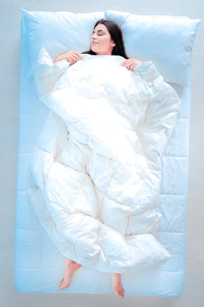 Woman Asleep In Bed