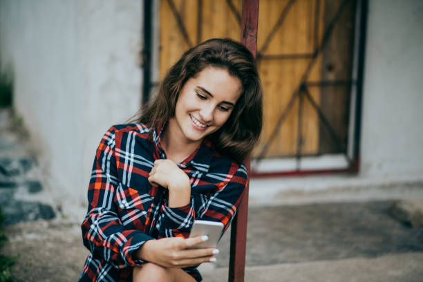 istock Young women using the phone 937245592