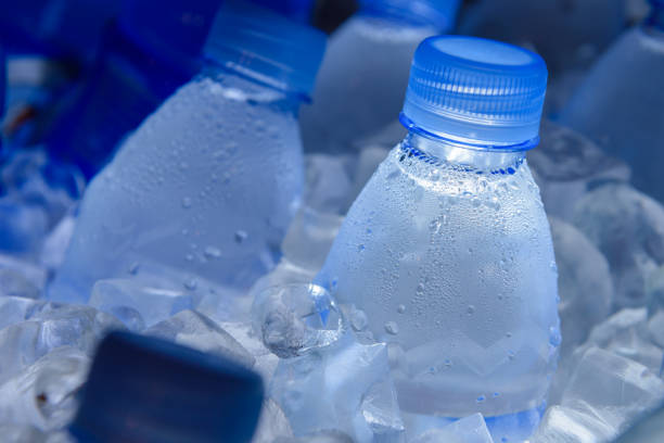 istock water bottle in ice,fresh water 937249474
