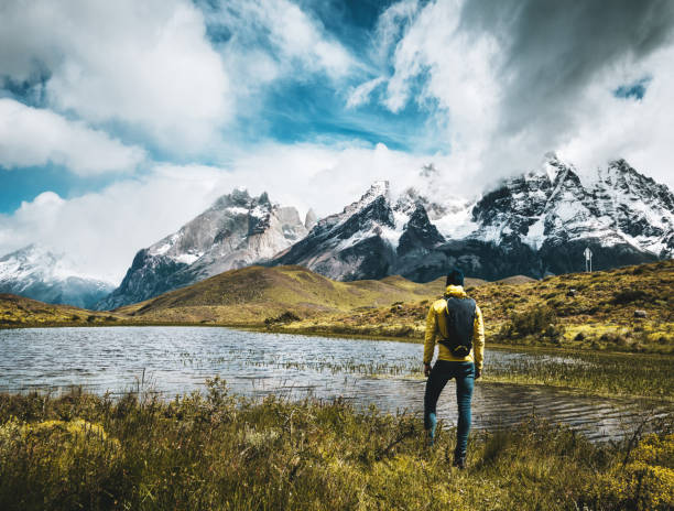 istock man hiking at torres del paine - chile 937257160