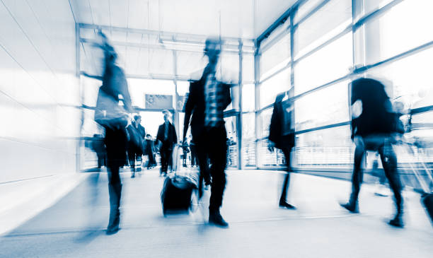 istock blurred crowd of people 937257644