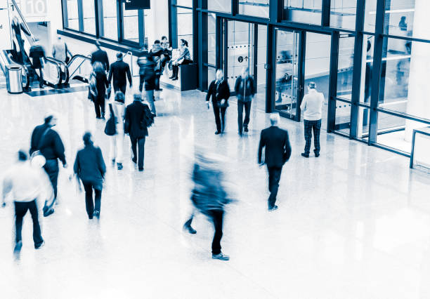 istock blurred crowd of people 937257670