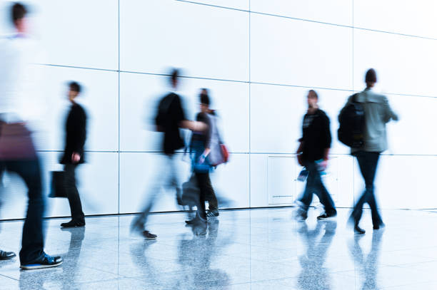 istock blurred crowd of people 937257748