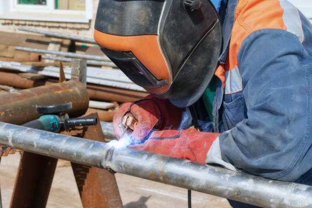 istock Manual arc welding of stainless steel pipe 937260568