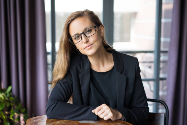 istock Confident Beautiful Business Woman at Cafe Table 937260580