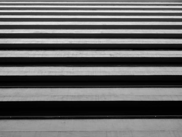istock Looking up to sky from modern concrete building,Abstract layer of architecture 937261100