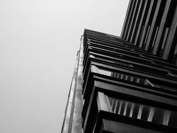 istock Looking up to sky from modern concrete building,Abstract layer of architecture 937261102