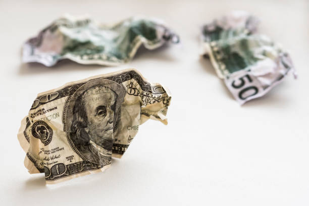 istock Dismantled one hundred and fifty dollars on a white background 937262472