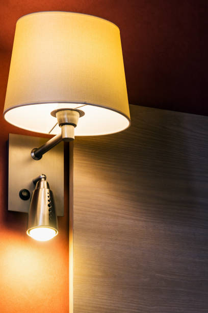 istock sconce over the bed in the room or hotel room 937269870