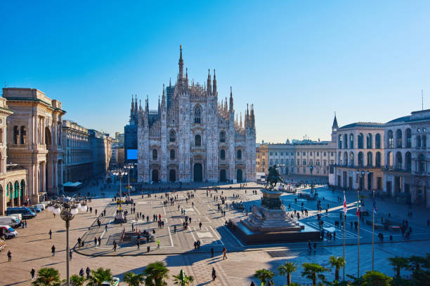 Milan Piazza Del Duomo at Morning, Milan, Italy Milan Piazza Del Duomo and Duomo Di Milano at morning in blue sky, Milan, Italy. cathedrals stock pictures, royalty-free photos & images
