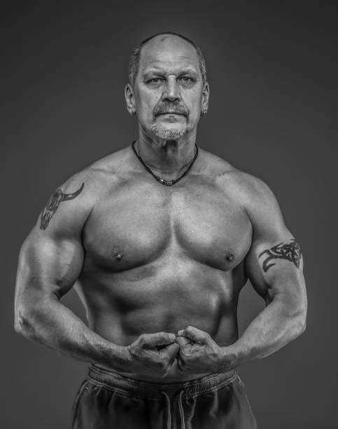 istock male with muscular body posing in studio 937271626
