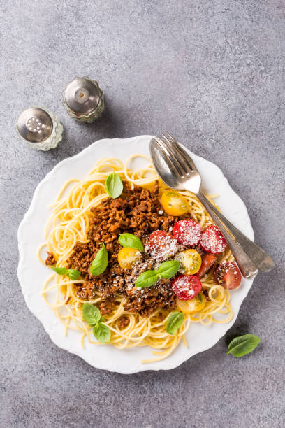 istock Spaghetti Bolognaise topped with minced beef 937275448