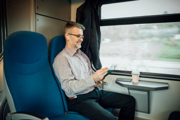 istock Businessman in the train 937275856