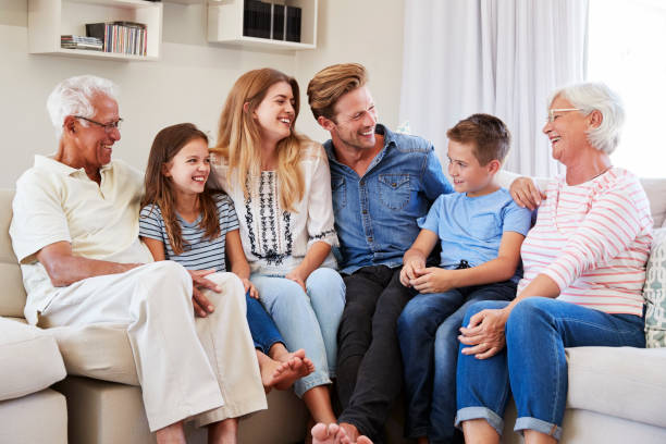 istock Multi Generation Family Relaxing On Sofa At Home Together 937278504