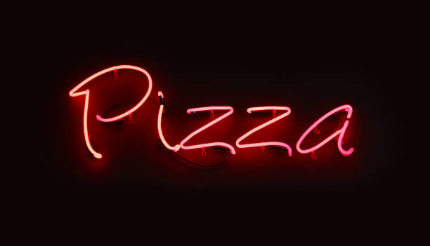 istock Close up PIZZA red neon light sign over black 937281868