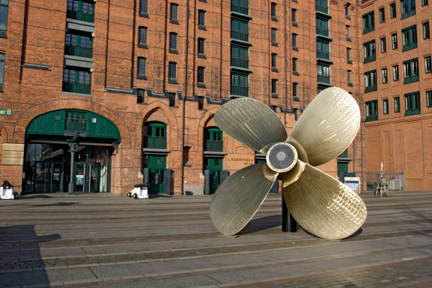 Hamburg, Germany - November 13, 2016: Big screw-propeller before The International Maritime Museum in Hamburg's Speicherstadt. Kaispeicher B building was redesigned and modernized in Hamburg