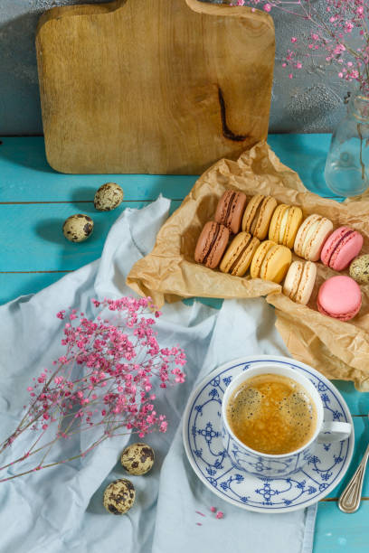 istock Macaroons and coffee. Blue, rose and baige colors. 937285780