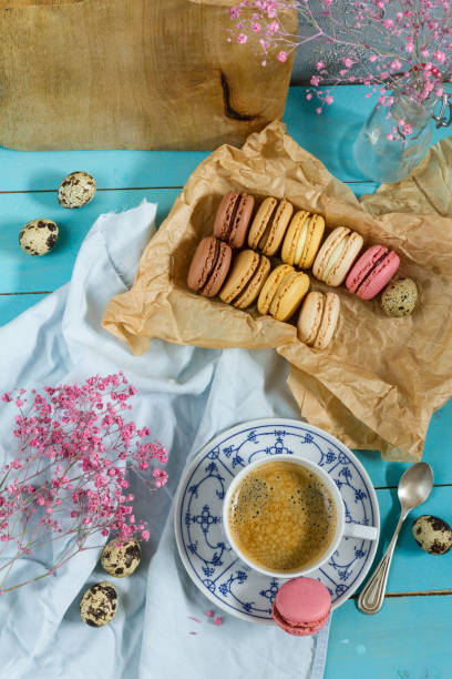 istock Macaroons and coffee. Blue, rose and baige colors. 937286412
