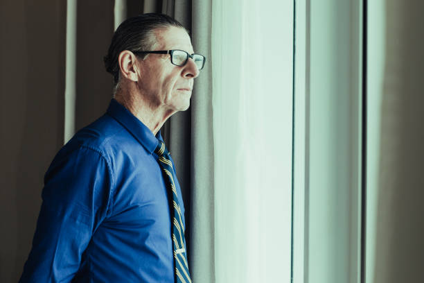 istock Thoughtful Senior Businessman Looking Out Window 937287088