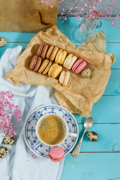 istock Macaroons and coffee. Blue, rose and baige colors. 937289726