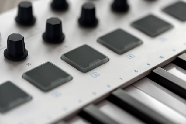 istock MIDI keyboard with pads and faders. 937290372
