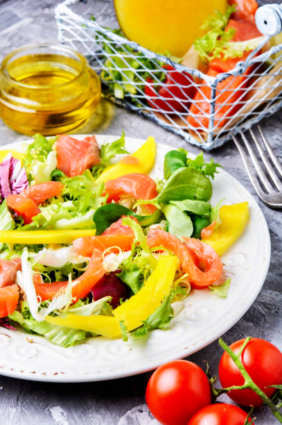 istock Fish salad with salmon and vegetables 937294202