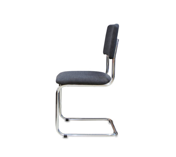 istock Profile view of modern office chair from gray cloth over white 937295342
