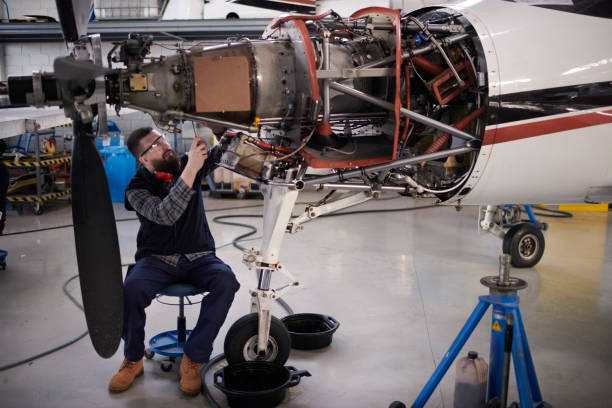 istock Aircraft mechanic in the hangar 937295932