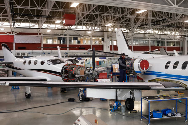istock Aircraft mechanic in the hangar 937298284