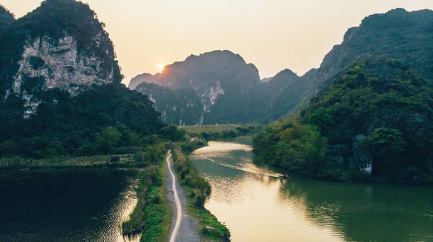 Scenic Aerial view of river in mountains in  Tom Coc, North Vietnam
