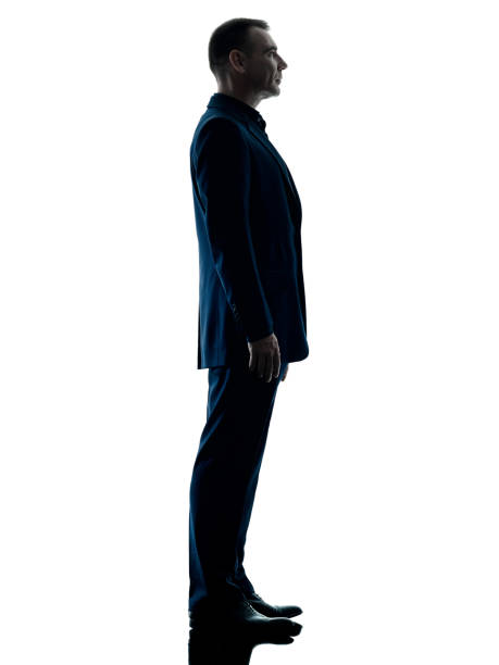 istock business man standing silhouette isolated 937317664