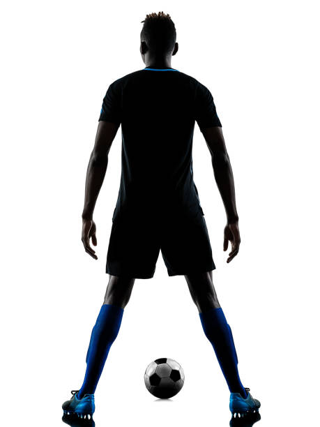 istock one african soccer player man isolated white background silhouet 937318024